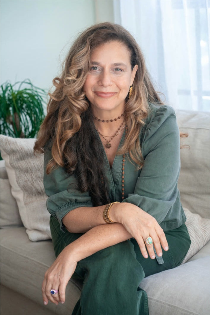 Marcela Benson seated at home