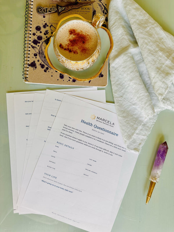 Assessment forms, journal and tea, ready before your first session